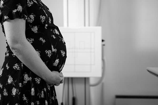pregnant woman health care insurance travel