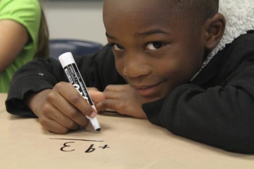 kids solving numbers